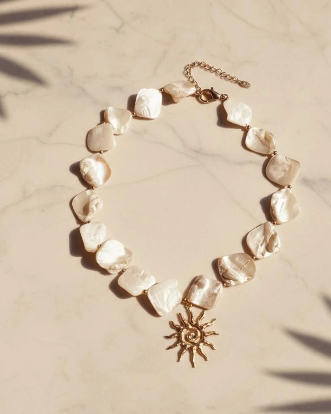 Soléa Necklace Sun, Shell-bead necklace with a sun